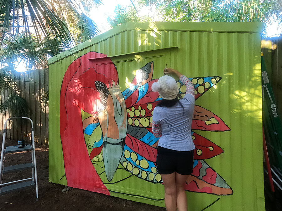 Patricia Filomeno Pink Flamingo Artist born in Peru creating tropical mural art in Sarasota Florida