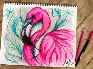 Sarasota artist Patricia Filomeno creating pink flamingo artwork in her Florida studio